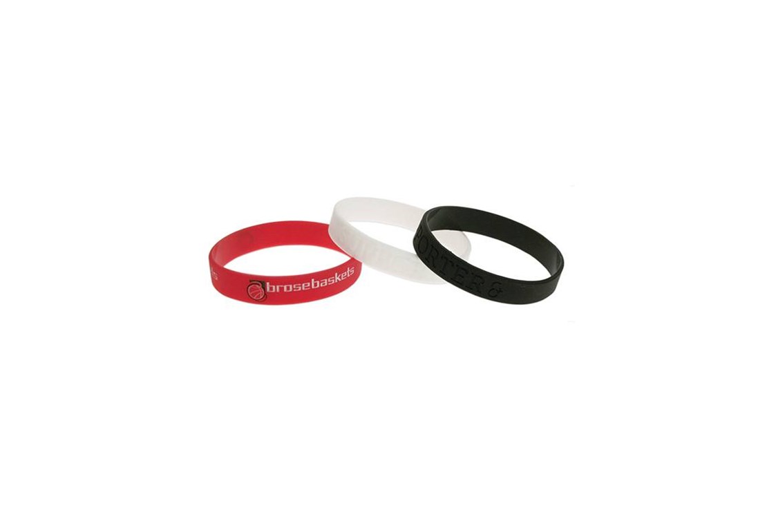 Dienstleister: Farbige Silikonarmbänder werden bedruckt oder geprägt, bereits ab 300 Stück. - Pins & mehr GmbH & Co. KG