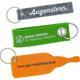 Dienstleister: Schlüsselanhänger aus Filz in individuellen Formen, große Auswahl an Filz-Farben, ab 300 Stück. - Pins & mehr GmbH & Co.KG